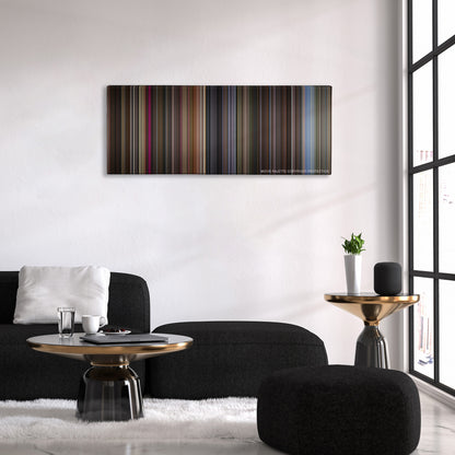 The Gentlemen color palette canvas above a black sofa with a gold-topped table