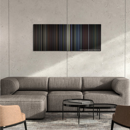 Star Trek: First Contact color palette canvas on a concrete wall above a gray sectional sofa