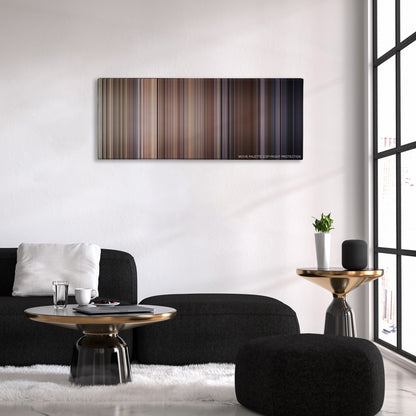 Dog Day Afternoon color palette canvas above a black sofa with a gold-topped table