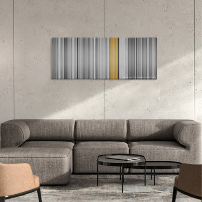 Clerks color palette canvas on a concrete wall above a gray sectional sofa