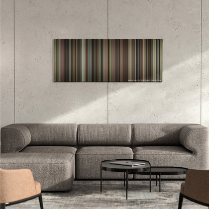 Julie & Julia color palette canvas on a concrete wall above a gray sectional sofa