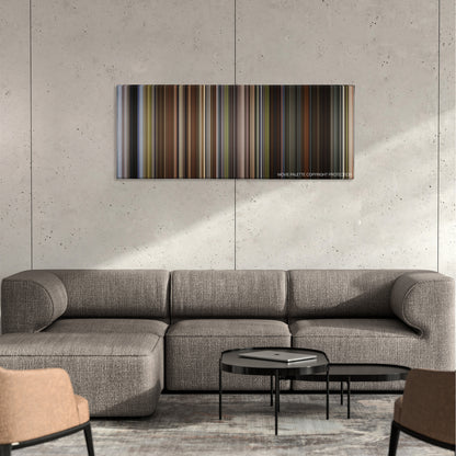 Great Expectations color palette canvas on a concrete wall above a gray sectional sofa