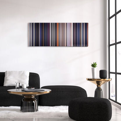 The Outsiders color palette canvas above a black sofa with a gold-topped table