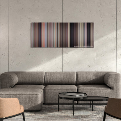 Boyz n the Hood color palette canvas on a concrete wall above a gray sectional sofa