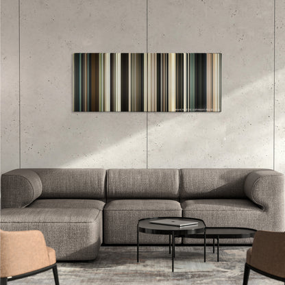 The Men Who Stare at Goats color palette canvas on a concrete wall above a gray sectional sofa