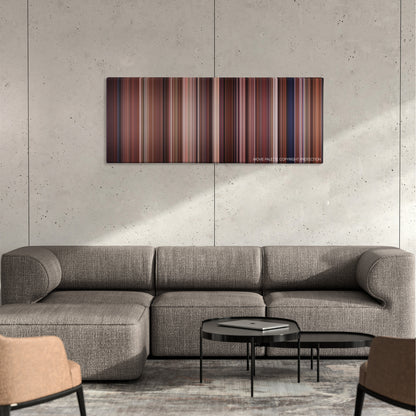 Road House color palette canvas on a concrete wall above a gray sectional sofa