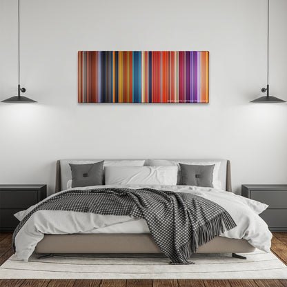 Brother Bear color palette canvas above a bed, between two black pendant lamps