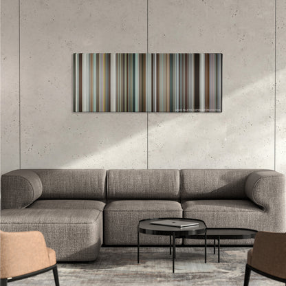 Spotlight color palette canvas on a concrete wall above a gray sectional sofa