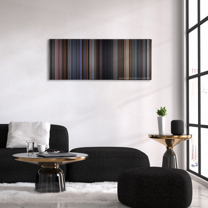 GoldenEye color palette canvas above a black sofa with a gold-topped table