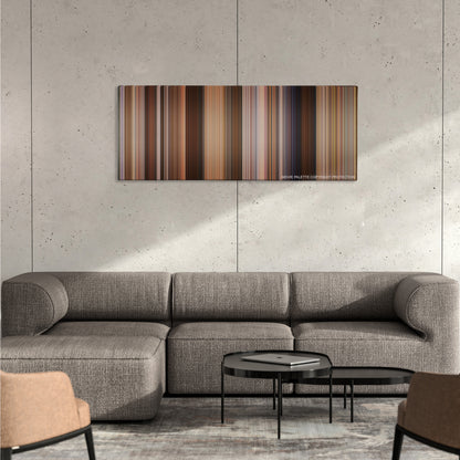 She's Out of My League color palette canvas on a concrete wall above a gray sectional sofa