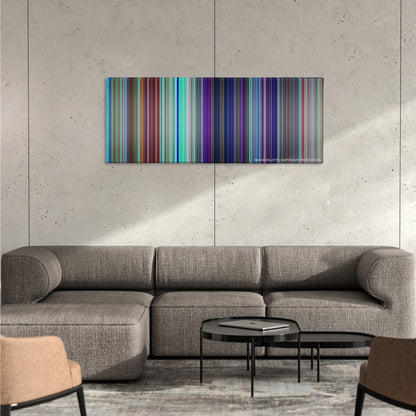 Shark Tale color palette canvas on a concrete wall above a gray sectional sofa