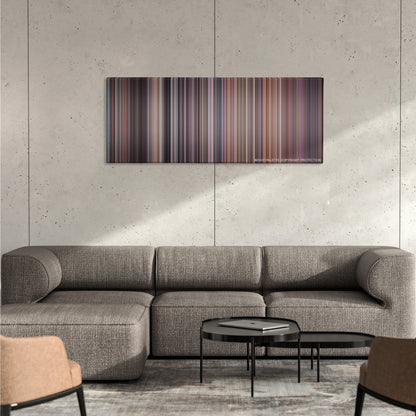 The Fugitive color palette canvas on a concrete wall above a gray sectional sofa