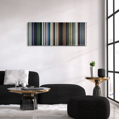 Chronicle color palette canvas above a black sofa with a gold-topped table