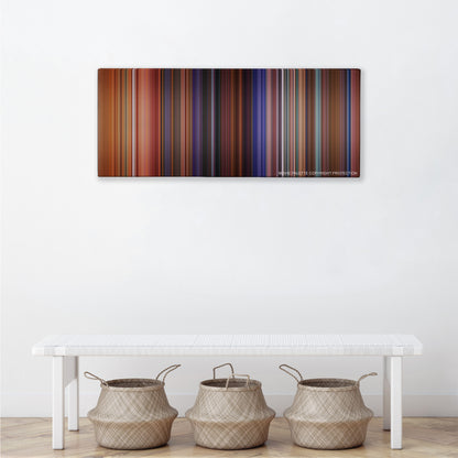 Eyes Wide Shut color palette canvas above a white bench with three woven baskets