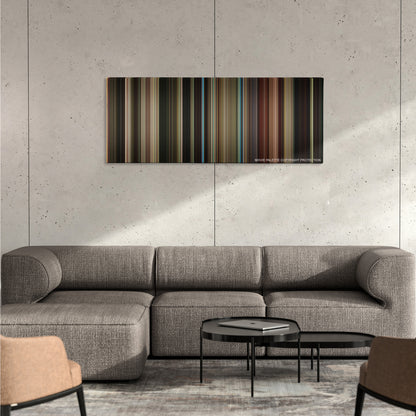 Taxi Driver color palette canvas on a concrete wall above a gray sectional sofa