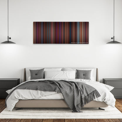 Burlesque color palette canvas above a bed, between two black pendant lamps