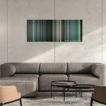 The Bourne Ultimatum color palette canvas on a concrete wall above a gray sectional sofa