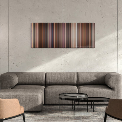 How to Lose a Guy in 10 Days color palette canvas on a concrete wall above a gray sectional sofa