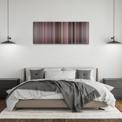 A Fish Called Wanda color palette canvas above a bed, between two black pendant lamps