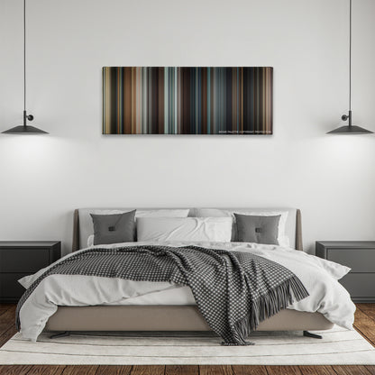 Taken color palette canvas above a bed, between two black pendant lamps