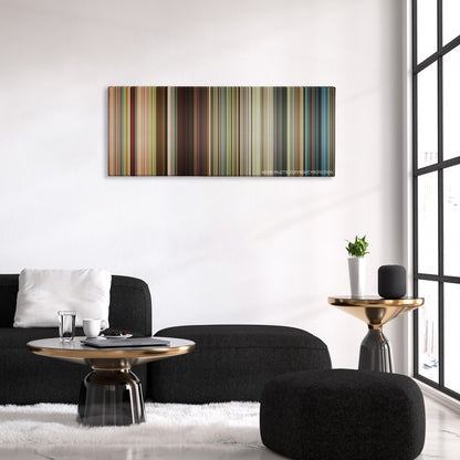 Mr. Right color palette canvas above a black sofa with a gold-topped table