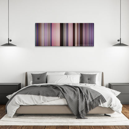 The Replacements color palette canvas above a bed, between two black pendant lamps