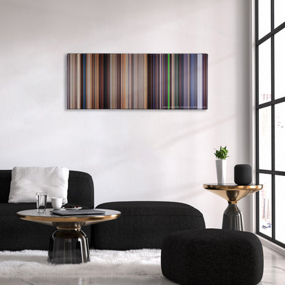 The Truman Show color palette canvas above a black sofa with a gold-topped table
