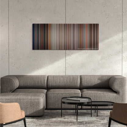 Speed color palette canvas on a concrete wall above a gray sectional sofa
