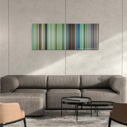 My Neighbor Totoro color palette canvas on a concrete wall above a gray sectional sofa