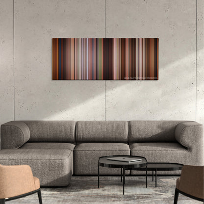 Kate & Leopold color palette canvas on a concrete wall above a gray sectional sofa
