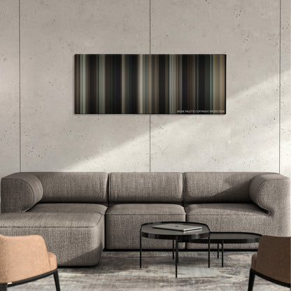 Paterson color palette canvas on a concrete wall above a gray sectional sofa