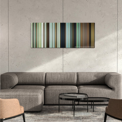 Moonlight color palette canvas on a concrete wall above a gray sectional sofa