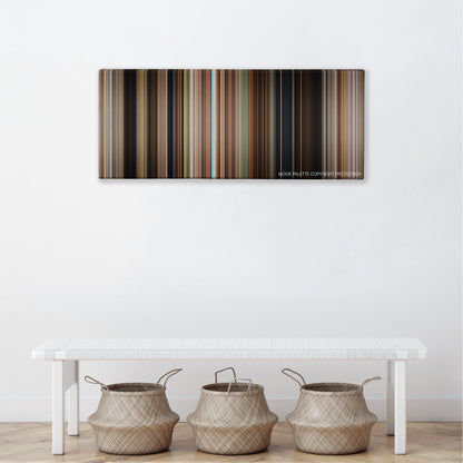 Secondhand Lions color palette canvas above a white bench with three woven baskets