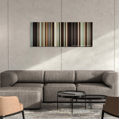 Portrait of a Lady on Fire color palette canvas on a concrete wall above a gray sectional sofa