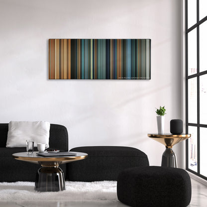Alita: Battle Angel color palette canvas above a black sofa with a gold-topped table