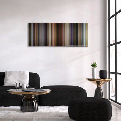 Spy color palette canvas above a black sofa with a gold-topped table