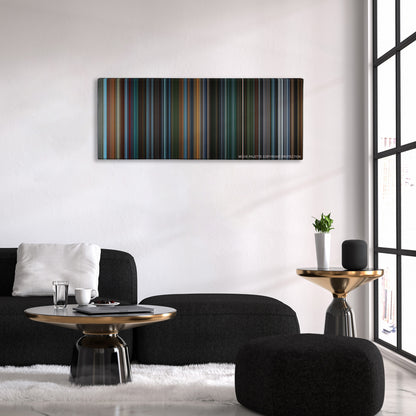 X2: X-Men United color palette canvas above a black sofa with a gold-topped table