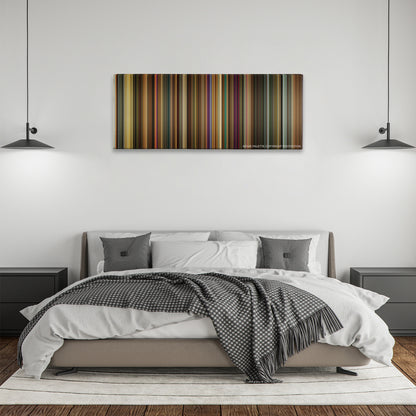 Across the Universe color palette canvas above a bed, between two black pendant lamps