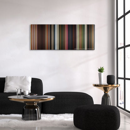 Madagascar color palette canvas above a black sofa with a gold-topped table