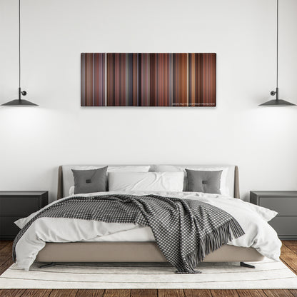 Hoosiers color palette canvas above a bed, between two black pendant lamps