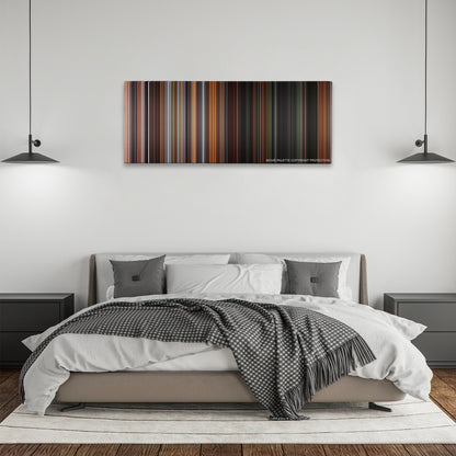 What Dreams May Come color palette canvas above a bed, between two black pendant lamps