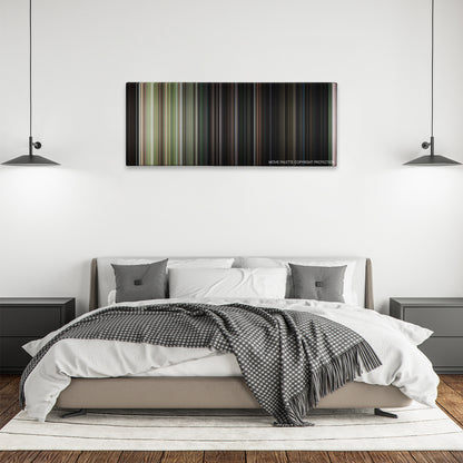 Friday the 13th color palette canvas above a bed, between two black pendant lamps