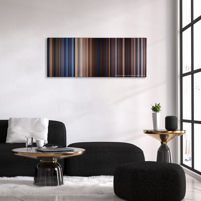 Stargate color palette canvas above a black sofa with a gold-topped table