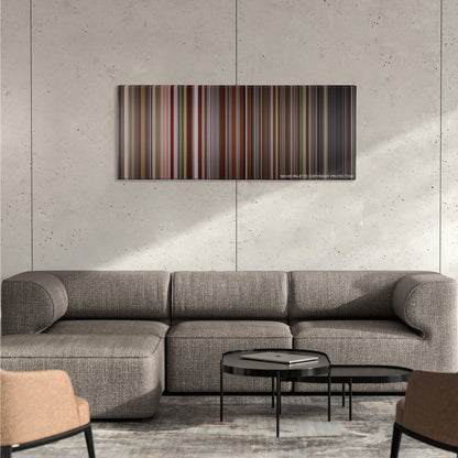 Barry Lyndon color palette canvas on a concrete wall above a gray sectional sofa