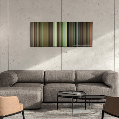 Driving Miss Daisy color palette canvas on a concrete wall above a gray sectional sofa