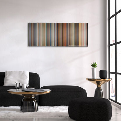 Crank color palette canvas above a black sofa with a gold-topped table