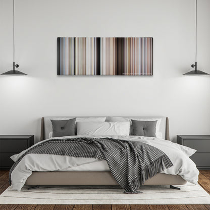 The Road Warrior color palette canvas above a bed, between two black pendant lamps