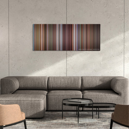 The Room color palette canvas on a concrete wall above a gray sectional sofa
