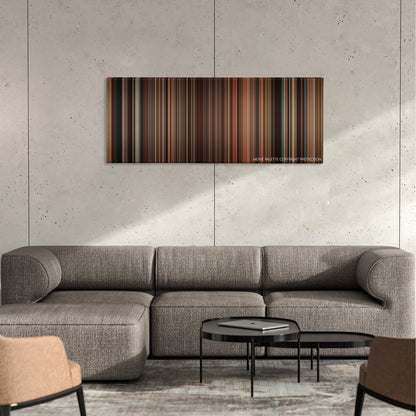 Eat Pray Love color palette canvas on a concrete wall above a gray sectional sofa
