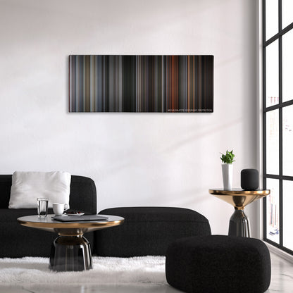 First Blood color palette canvas above a black sofa with a gold-topped table